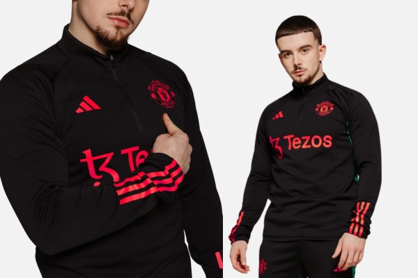 Jaqueta de Treino Manchester United Adidas 2023-2024 preta, verde e vermelha, inspirada no kit oficial. Tecnologia AEROREADY, orifícios para polegares e estilo incomparável para elevar seu jogo.